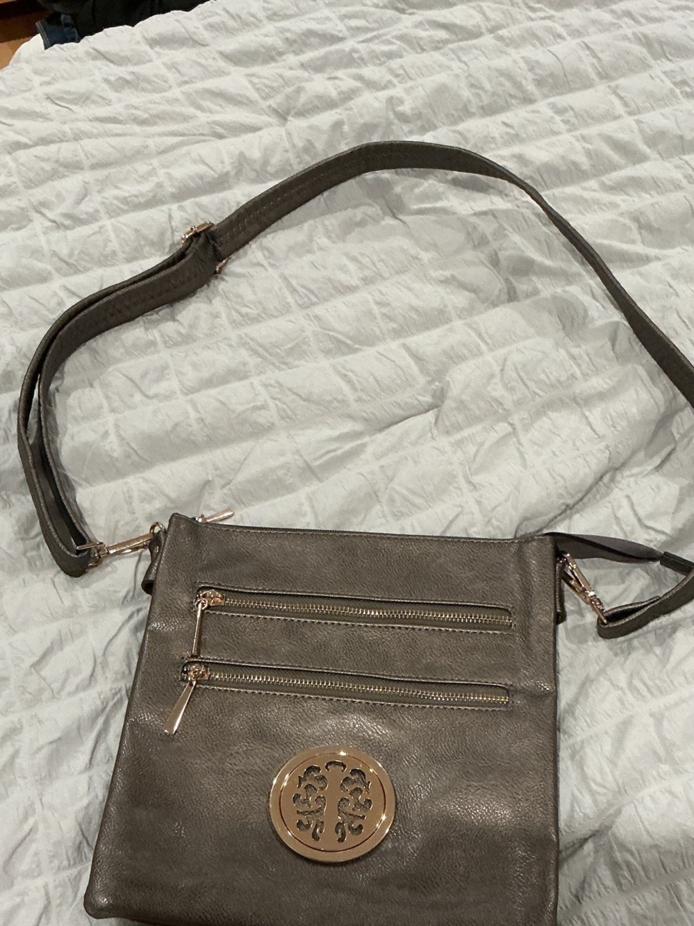 Stylish Women's Crossbody Bag in Metallic Taupe with Gold Emblem